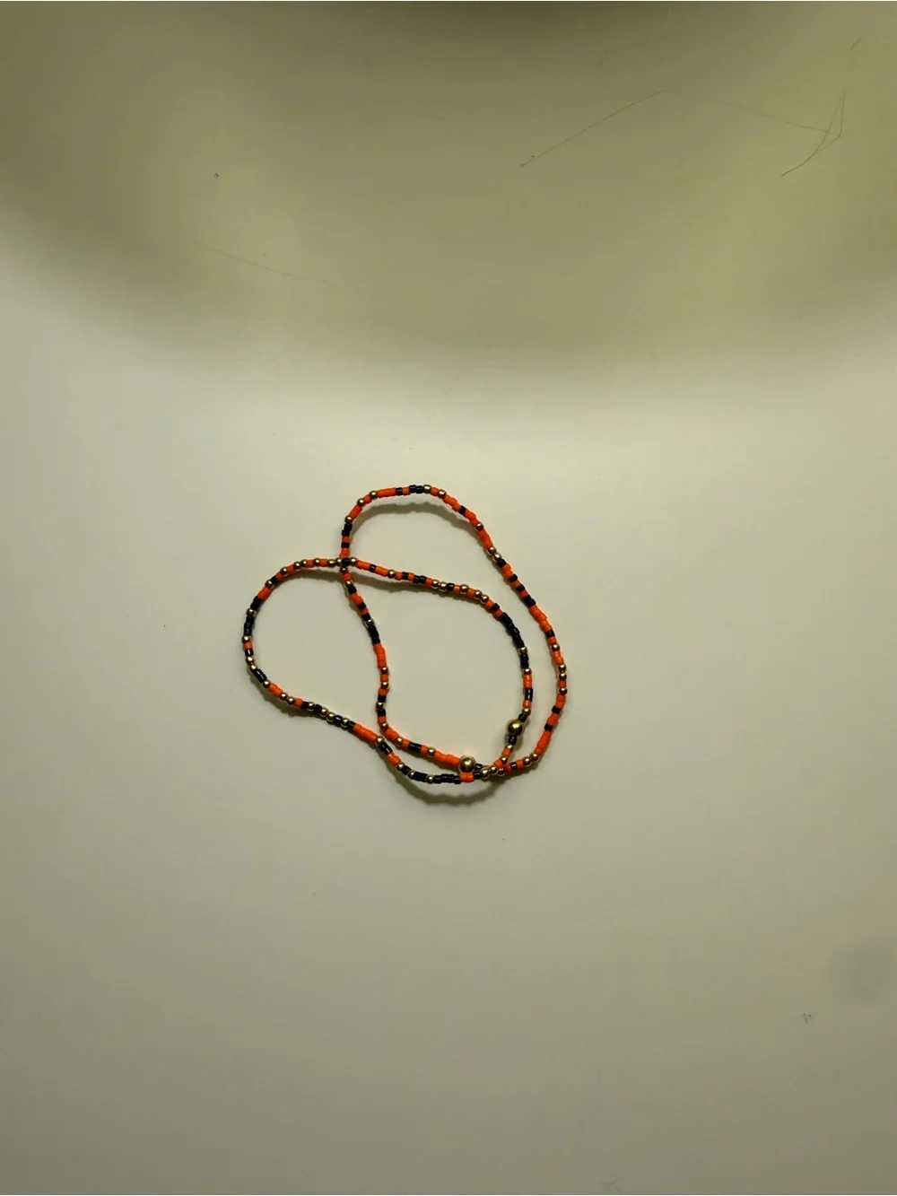 Orange Blue and Gold beaded bracelet
